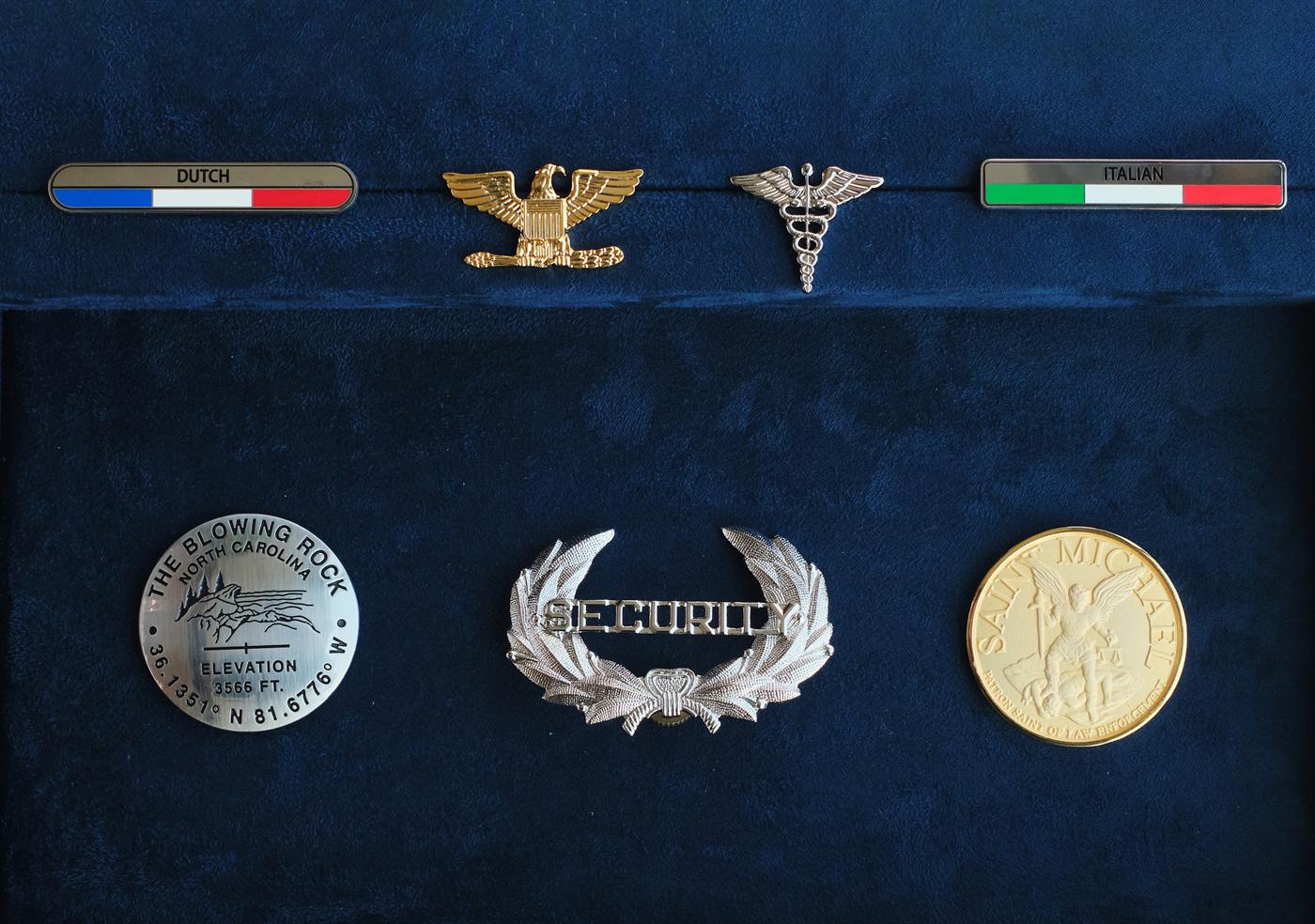 Identity-critical badges, nameplates, and insignia